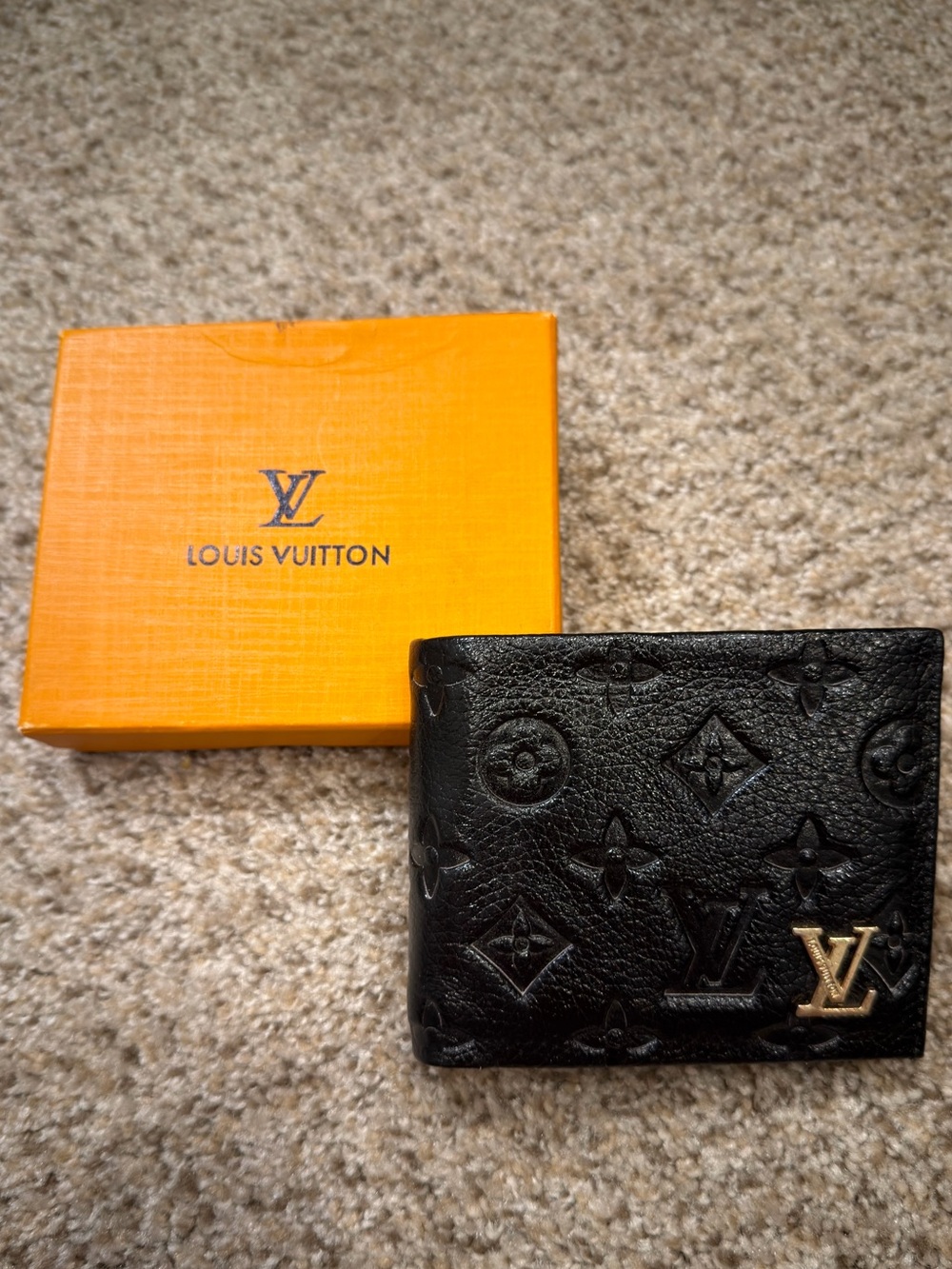 Louis Vuitton Black Embossed Monogram Bifold Wallet with Gold LV Accent